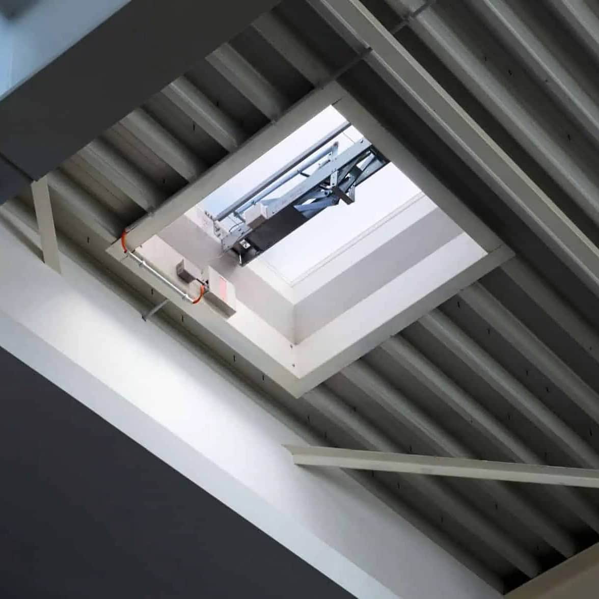 Smoke vent service - maintenance and repairs 13 Smoke extraction system with glass roof and ventilation mechanism.