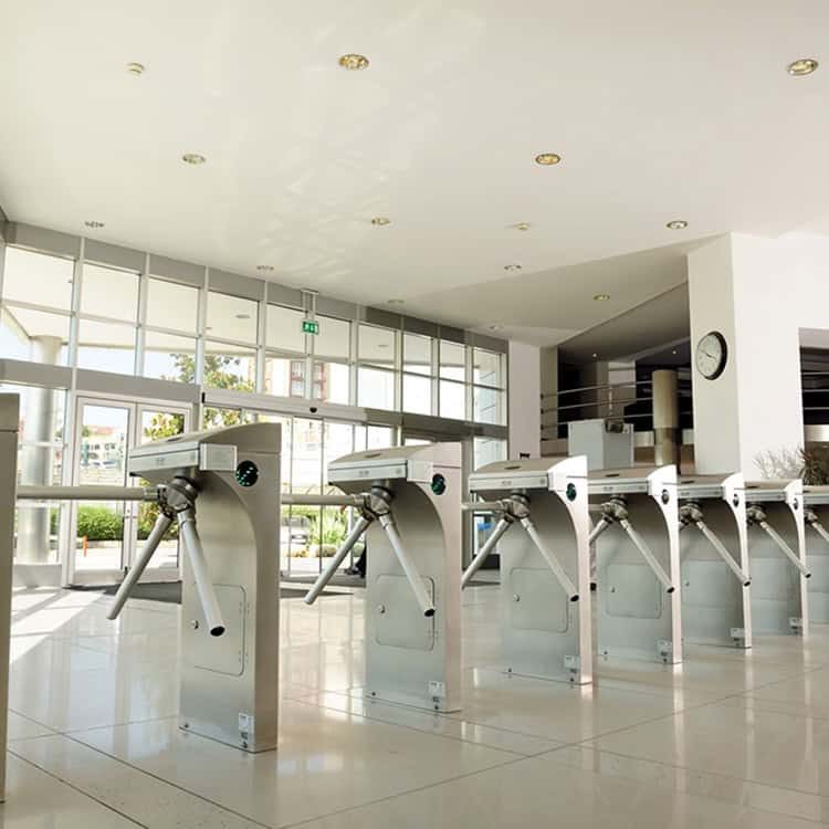 Modern turnstiles for access control in commercial buildings.
